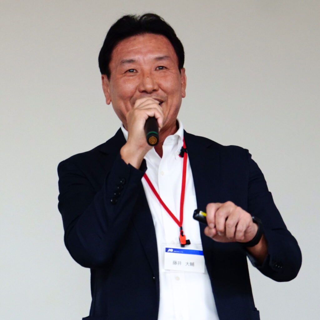 JTBの取り組みについて説明する取締役 常務執行役員 経営戦略担当(CSO)DX担当(CDXO)藤井さん